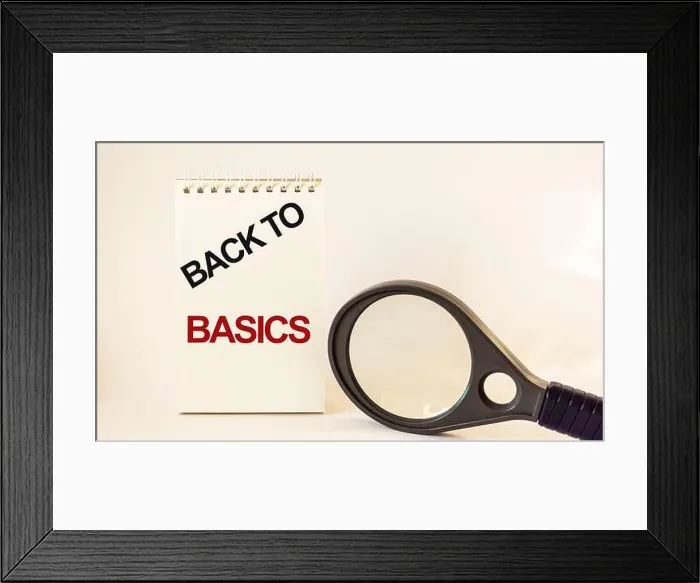 Framed Print : BACK TO BASIC, text written on notepad and white background, near a magnifying glass Framed Print : BACK TO BASIC, text written on notepad and white background, near a magnifying glass