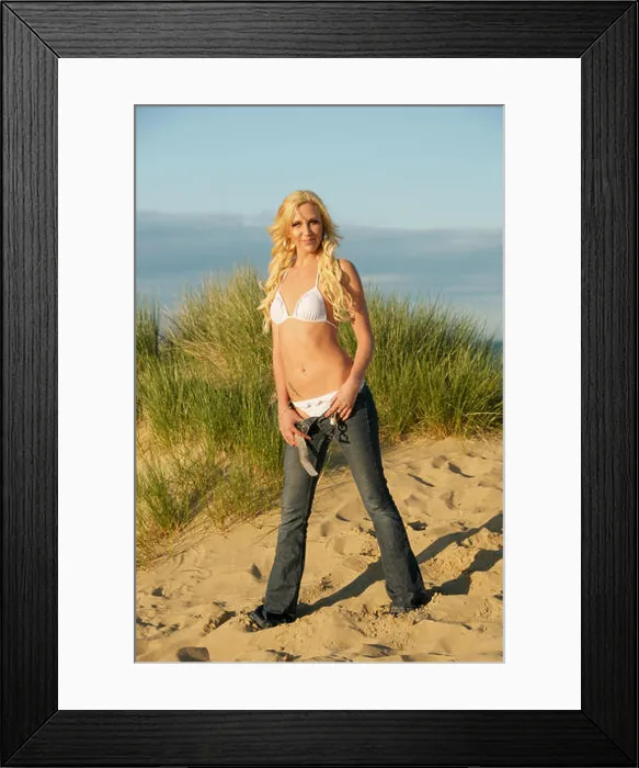 Framed Print : Beautiful Blonde young woman in jeans and bikini on Studland Beach, Dorset, England Framed Print : Beautiful Blonde young woman in jeans and bikini on Studland Beach, Dorset, England