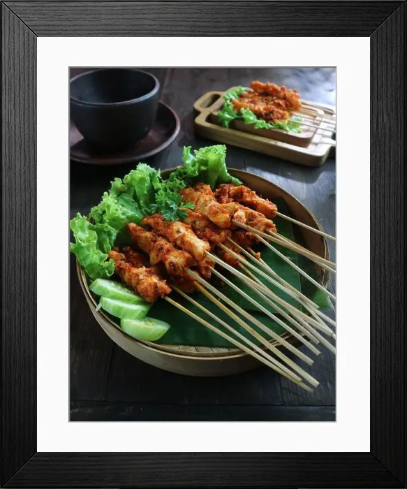 Framed Print : cooking fish with curry sauce and cayenne pepper in a clay dish Framed Print : cooking fish with curry sauce and cayenne pepper in a clay dish