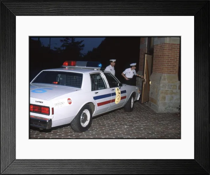 Framed Print : Circa 1980 photograph shows a female