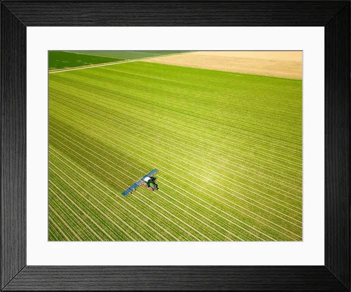 Framed Print : Aerial view of a dutch farmer working on its land, Flevoland, The Netherlands Framed Print : Aerial view of a dutch farmer working on its land, Flevoland, The Netherlands