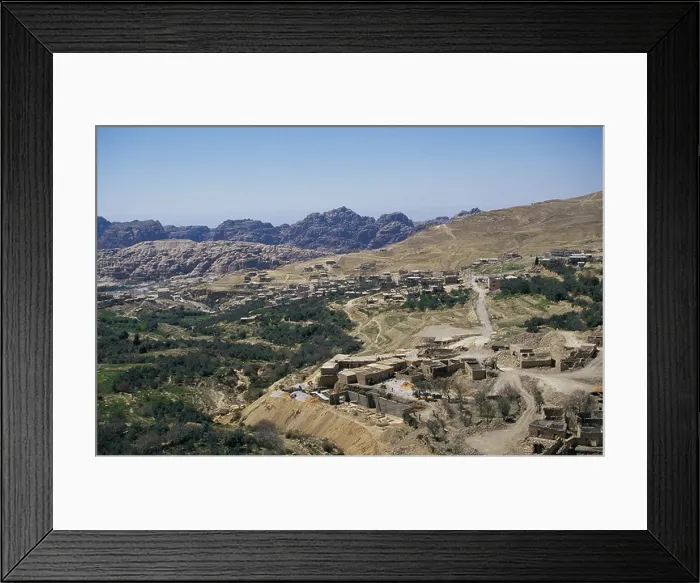 Framed Print : A view of the Jordan countryside and a small mountain village near the Petra area of Jordan Framed Print : A view of the Jordan countryside and a small mountain village near the Petra area of Jordan
