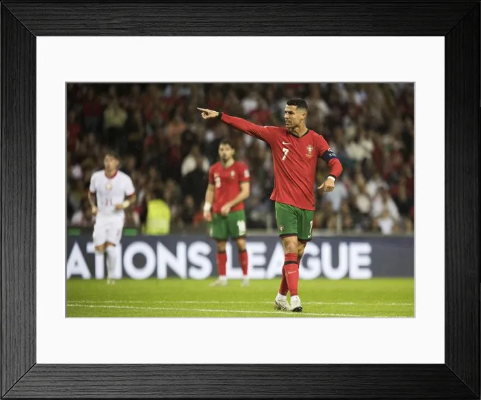 Framed Print : Football match, captain Cristiano RONALDO CR7 Portugal points angrily with his left arm and index finger to the left Framed Print : Football match, captain Cristiano RONALDO CR7 Portugal points angrily with his left arm and index finger to the left