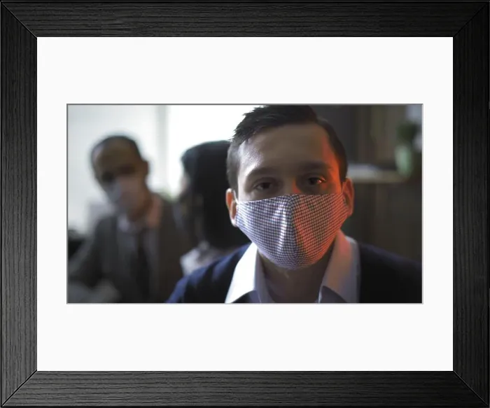 Framed Print : Serious Businessman In Protective Mask Backlit By Red Neon Framed Print : Serious Businessman In Protective Mask Backlit By Red Neon