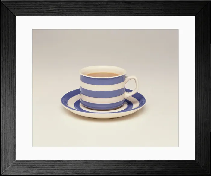 Framed Print : Cup and saucer filled with tea Framed Print : Cup and saucer filled with tea