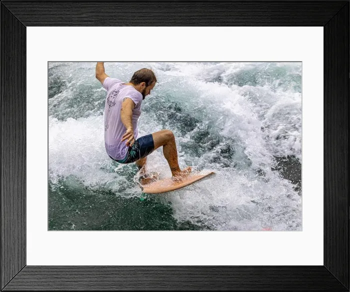 Framed Print : A surfer on the Aare river in Thun, Switzerland Framed Print : A surfer on the Aare river in Thun, Switzerland