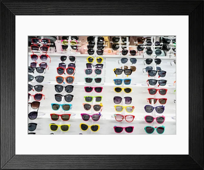 Framed Print : Chelyabinsk Region, Russia - June 2019. Shopping and entertainment complex Spring. sunglasses exhibition Framed Print : Chelyabinsk Region, Russia - June 2019. Shopping and entertainment complex Spring. sunglasses exhibition