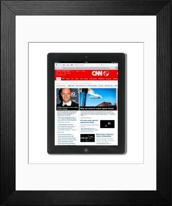 Framed Print : The CNN News website viewed on a 4th generation Apple iPad, USA Framed Print : The CNN News website viewed on a 4th generation Apple iPad, USA