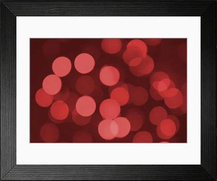 Framed Print : Defocused lights. Red bokeh on black background. Christmas and New year overlay. Copy space Framed Print : Defocused lights. Red bokeh on black background. Christmas and New year overlay. Copy space