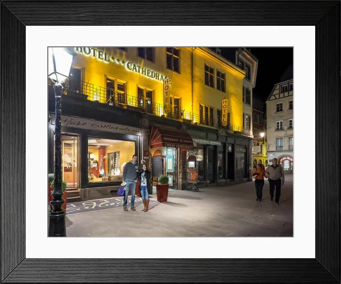 Framed Print : Strasbourg, Hotel de la Cathédrale building, people, night, Alsace, France, Europe Framed Print : Strasbourg, Hotel de la Cathédrale building, people, night, Alsace, France, Europe