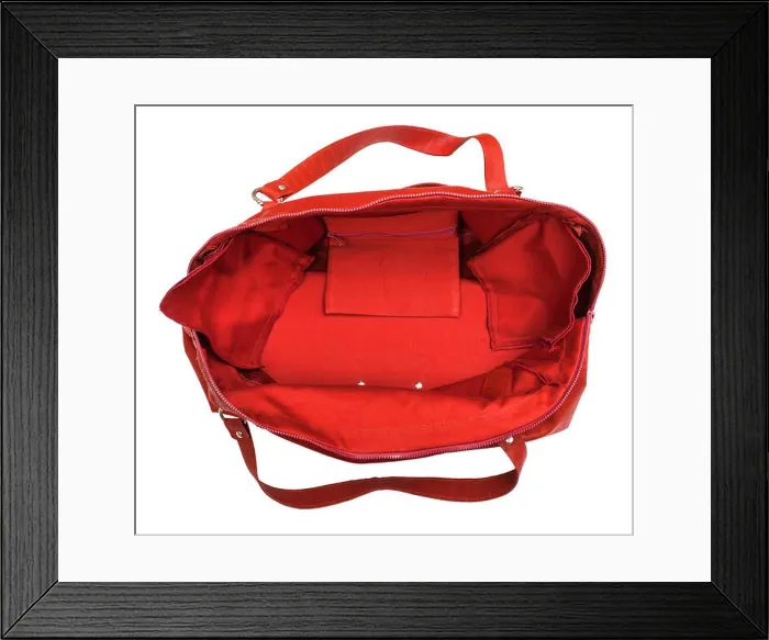 Framed Print : top view of open empty red travelling bag isolated on white background Framed Print : top view of open empty red travelling bag isolated on white background