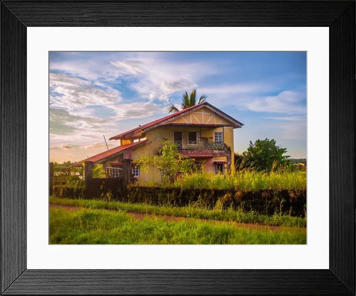Framed Print : Traditional Indian village house surrounded by green grass and beatiful sunset sky. Village landscape Framed Print : Traditional Indian village house surrounded by green grass and beatiful sunset sky. Village landscape