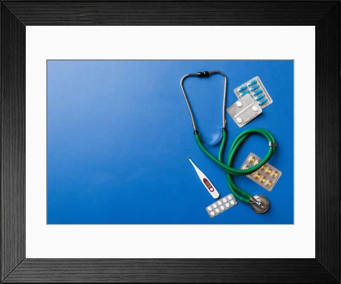 Framed Print : Medical background. Many different various medicine tablets or pills on the table with stethoscope Framed Print : Medical background. Many different various medicine tablets or pills on the table with stethoscope