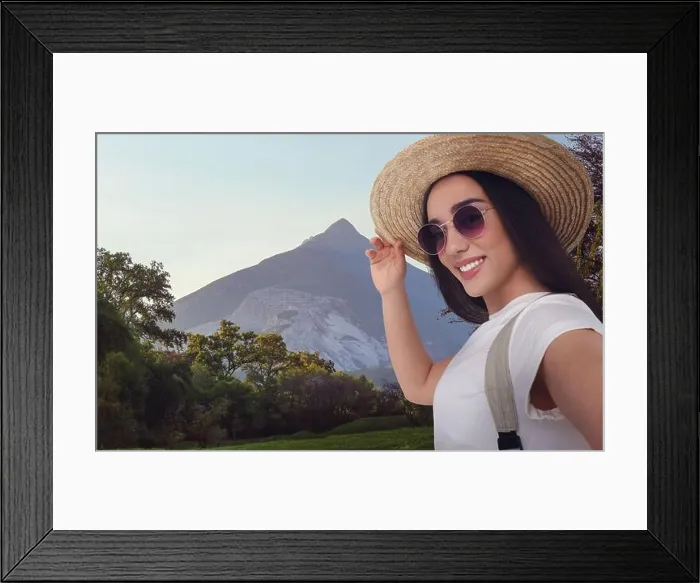 Framed Print : Beautiful woman in straw hat taking selfie in mountains Framed Print : Beautiful woman in straw hat taking selfie in mountains