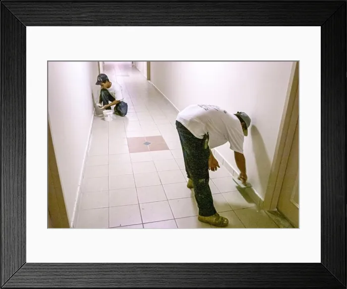 Framed Print : Miami Beach Florida, Hispanic man installer installing new tile inside interior condominium condo residential apartment Framed Print : Miami Beach Florida, Hispanic man installer installing new tile inside interior condominium condo residential apartment
