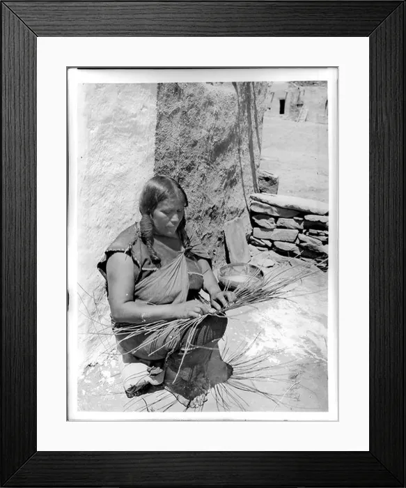 Framed Print : A photograph from around 1900 showing a Hopi Indian woman engaged in basket making Framed Print : A photograph from around 1900 showing a Hopi Indian woman engaged in basket making