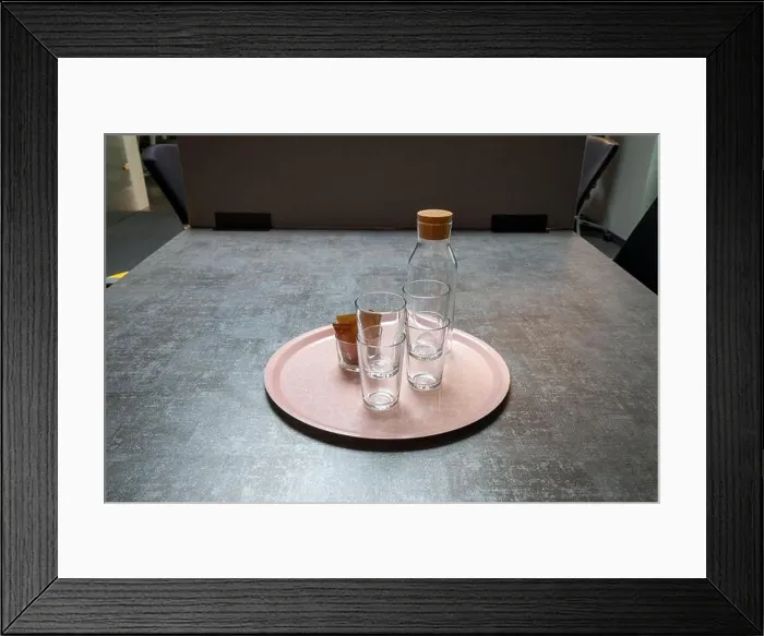 Framed Print : several glasses and a glass bottle on a tray