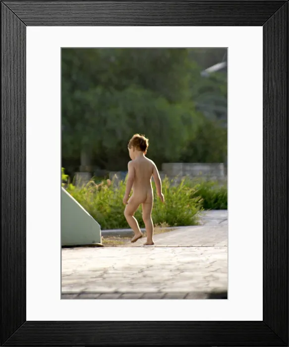 Framed Print : Young boy naked nude or bare walking Framed Print : Young boy naked nude or bare walking