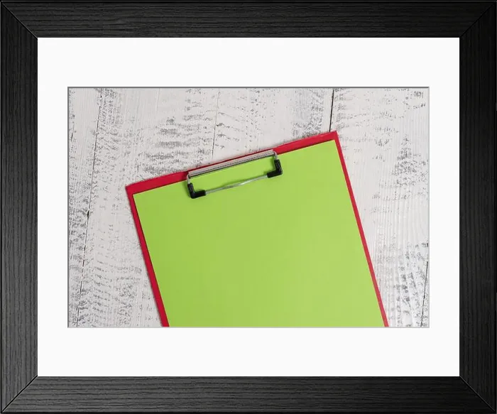 Framed Print : Close up front view colored clipboard blank paper sheet lying retro old wooden rustic vintage background at working Framed Print : Close up front view colored clipboard blank paper sheet lying retro old wooden rustic vintage background at working