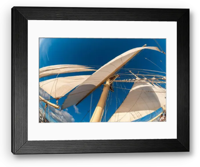 Framed Print : Looking up the at a mast and sails of a barquentine cruise ship Framed Print : Looking up the at a mast and sails of a barquentine cruise ship