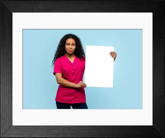 Framed Print : African American Female Nurse or Doctor in Pink Uniform holds Vertical Banner Blank Ad Space on Blue Background Framed Print : African American Female Nurse or Doctor in Pink Uniform holds Vertical Banner Blank Ad Space on Blue Background