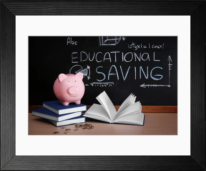 Framed Print : Piggy bank with books and coins on blackboard background. Educational savings concept Framed Print : Piggy bank with books and coins on blackboard background. Educational savings concept