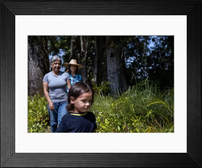 Framed Print : Gardening with children. Grandmother Framed Print : Gardening with children. Grandmother