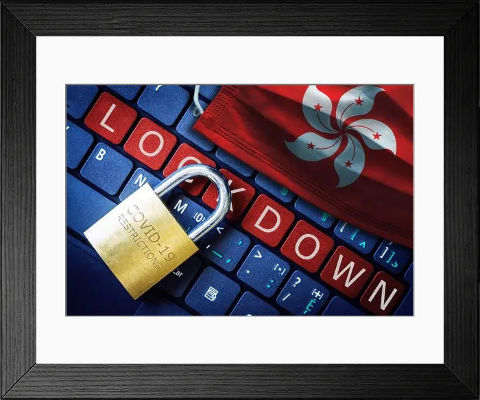 Framed Print : Hong Kong COVID-19 coronavirus lockdown restrictions concept illustrated by padlock on laptop red alert keyboard Framed Print : Hong Kong COVID-19 coronavirus lockdown restrictions concept illustrated by padlock on laptop red alert keyboard