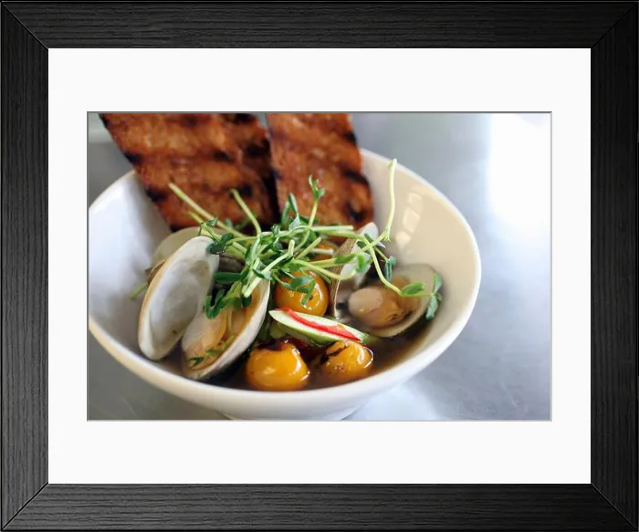 Framed Print : Bowl of clams in broth with roasted cherry tomatoes, cucumbers, red pepper, pea shoots and toast Framed Print : Bowl of clams in broth with roasted cherry tomatoes, cucumbers, red pepper, pea shoots and toast
