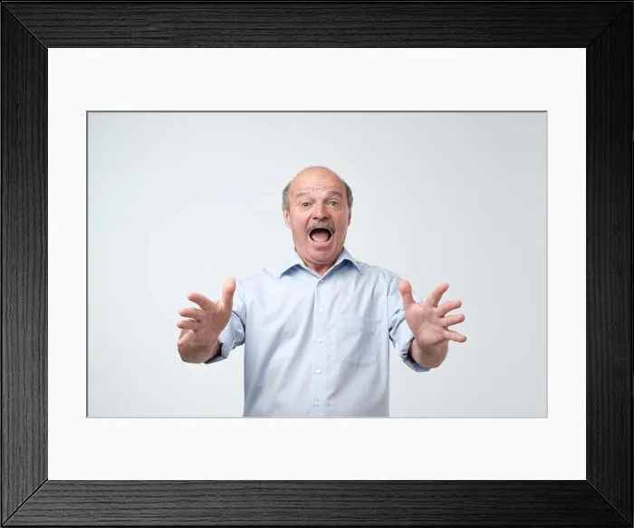 Framed Print : Studio shot of mature hispanic man against gray background. I can not belive what are you saying Framed Print : Studio shot of mature hispanic man against gray background. I can not belive what are you saying