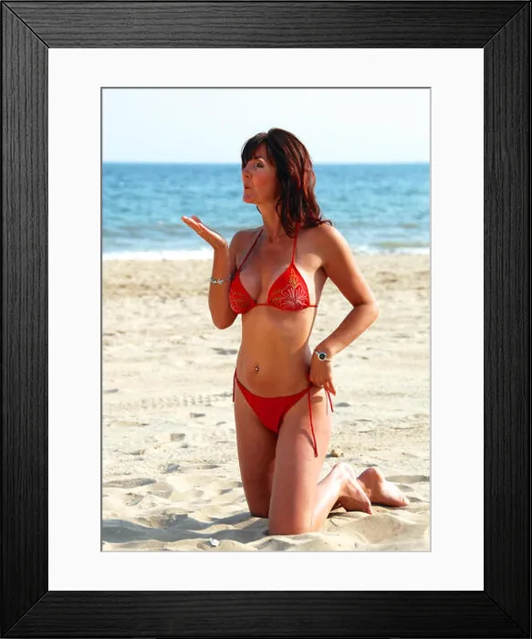 Framed Print : Beautiful brunette young woman in a red bikini on the beach Framed Print : Beautiful brunette young woman in a red bikini on the beach