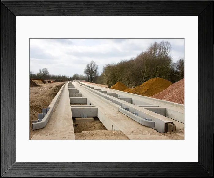 Framed Print : Start of a section of the new guided Bus track in the process of being built Framed Print : Start of a section of the new guided Bus track in the process of being built