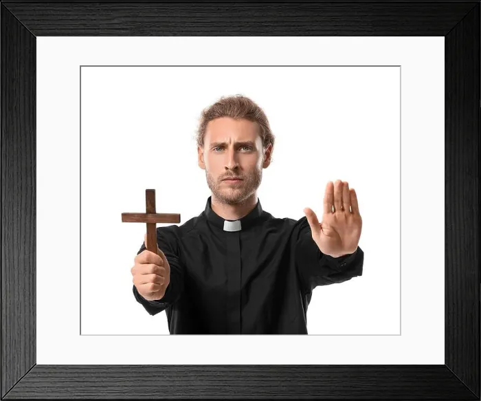 Framed Print : Male priest with cross on white background Framed Print : Male priest with cross on white background