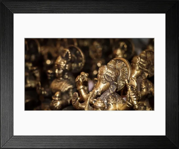 Framed Print : an antique idol of hindu god ganesha carved on stone in vintage gift shop for handcrafted statues and objects Framed Print : an antique idol of hindu god ganesha carved on stone in vintage gift shop for handcrafted statues and objects