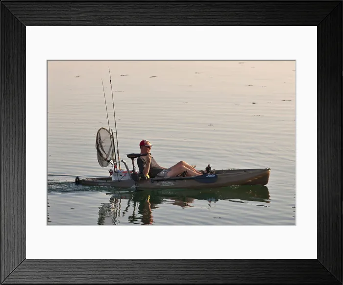 Framed Print : The Netherlands, Zierikzee, Fisherman in cycle-kayak with electric motor Framed Print : The Netherlands, Zierikzee, Fisherman in cycle-kayak with electric motor