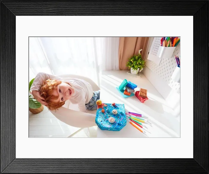 Framed Print : happy kid sitting at the desk with handcrafted solar system, made of modeling plasticine Framed Print : happy kid sitting at the desk with handcrafted solar system, made of modeling plasticine