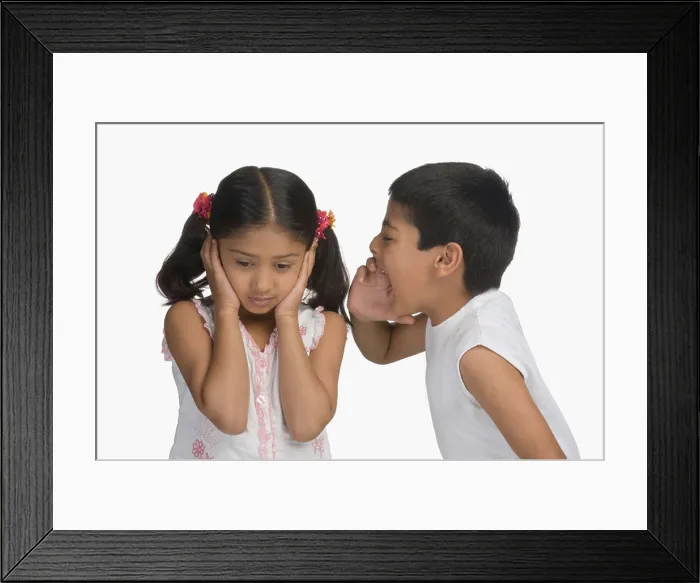 Framed Print : Girl covering her ears while her brother shouting Framed Print : Girl covering her ears while her brother shouting