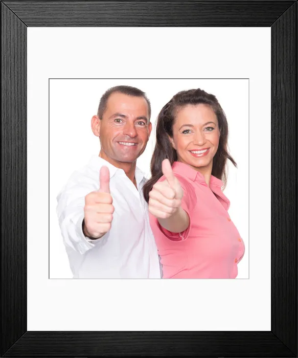 Framed Print : Happy couple in front of white background with thumbs up Framed Print : Happy couple in front of white background with thumbs up