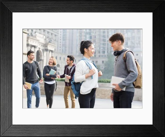 Framed Print : Cheerful abroad students talking on campus Framed Print : Cheerful abroad students talking on campus