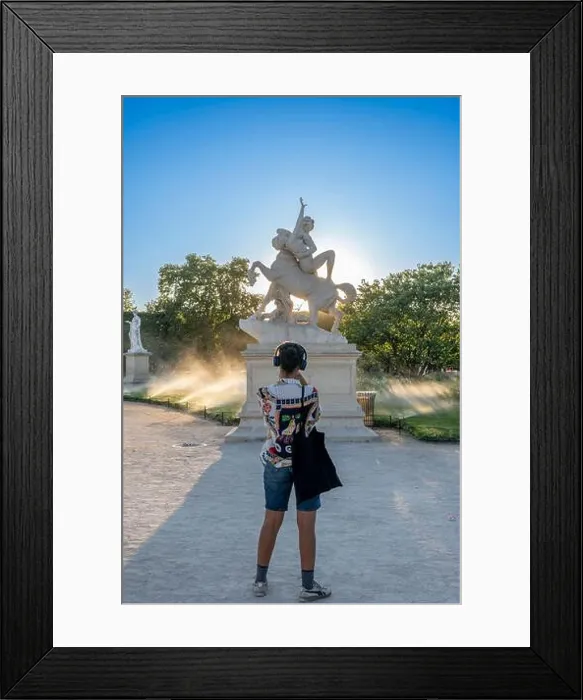 Framed Print : Paris, France - 07 03 2025: One woman take pictures of a statue in Tuileries garden Framed Print : Paris, France - 07 03 2025: One woman take pictures of a statue in Tuileries garden