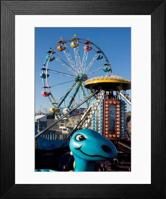 Framed Print : Kiddie ride and Ferris wheel at a carnival in the United States Framed Print : Kiddie ride and Ferris wheel at a carnival in the United States