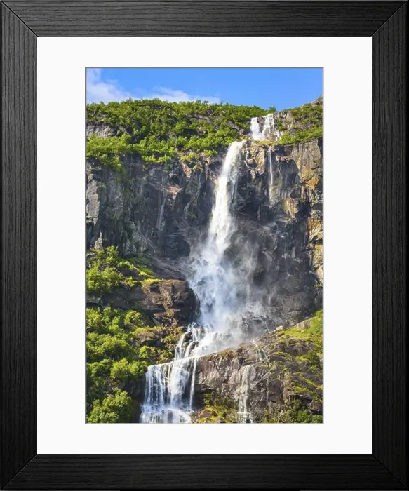 Framed Print : Waterfall, mountain cliff and green trees on the way to Briksdal or Briksdalsbreen glacier in Olden, Norway, Europe Framed Print : Waterfall, mountain cliff and green trees on the way to Briksdal or Briksdalsbreen glacier in Olden, Norway, Europe
