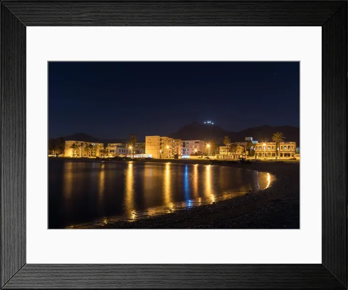 Framed Print : A Night View of Houses and Street Lights by the Sea in Tunis Framed Print : A Night View of Houses and Street Lights by the Sea in Tunis