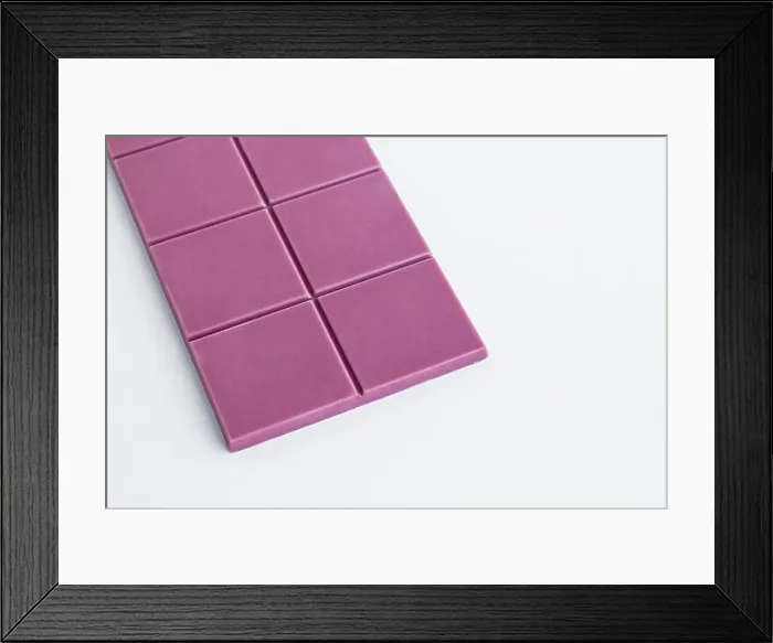 Framed Print : The fourth type in chocolate: Ruby on the white surface with copy space Framed Print : The fourth type in chocolate: Ruby on the white surface with copy space