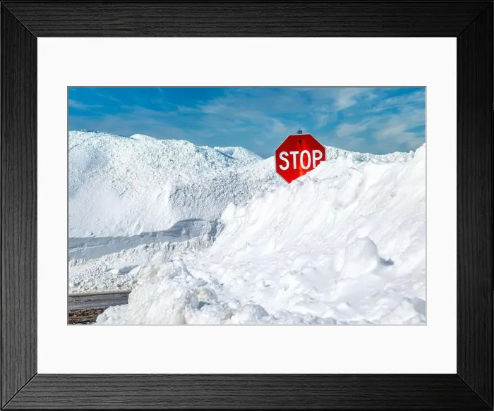 Framed Print : Stop sign in a snowbank Framed Print : Stop sign in a snowbank