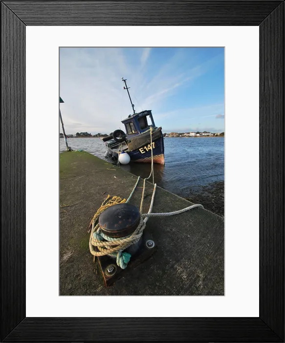 Framed Print : A local fishing vessel is seen at Mudeford Quay in Dorset, England Framed Print : A local fishing vessel is seen at Mudeford Quay in Dorset, England
