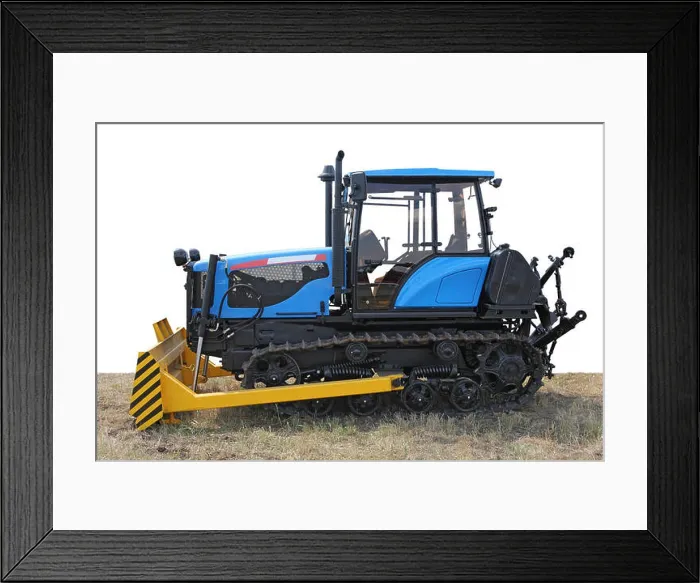 Framed Print : Blue building bulldozer tractor on grass Framed Print : Blue building bulldozer tractor on grass