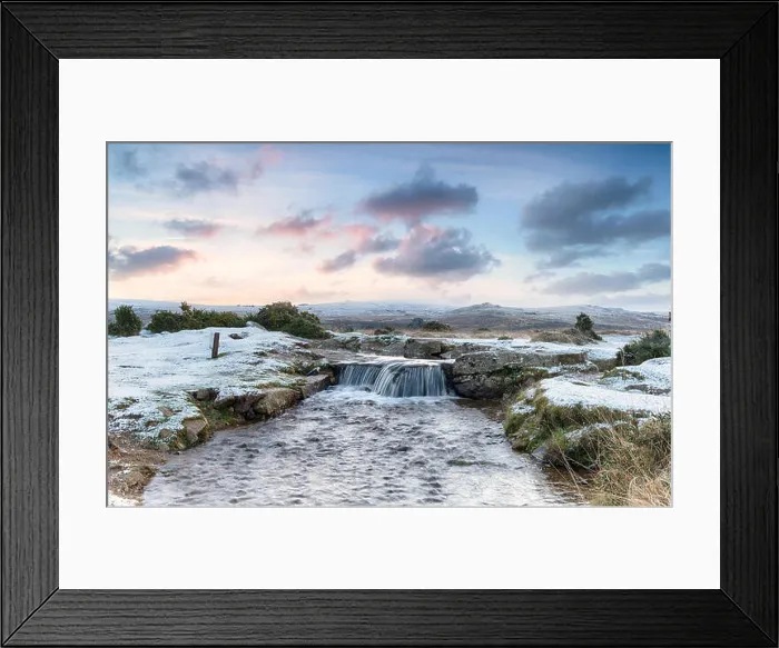 Framed Print : An idyllic winter scene with snow on the ground and a beautiful waterfall, on Dartmoor National Park in Devon