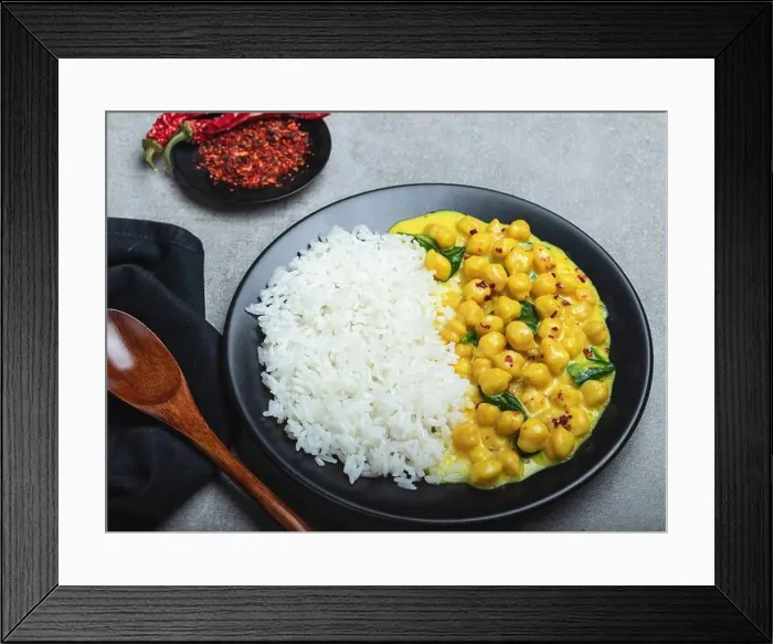 Framed Print : rice, chickpeas with coconut milk and curry. vegetarian dish Framed Print : rice, chickpeas with coconut milk and curry. vegetarian dish
