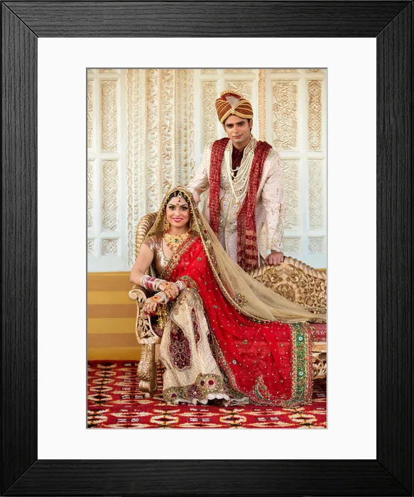 Framed Print : Indian bride and groom in traditional wedding dress Framed Print : Indian bride and groom in traditional wedding dress
